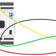 Połączenie mikrokontrolera z układem 24AA01 przez magistralę i2c. Żółty przewód to SCL, zielony to SDA.